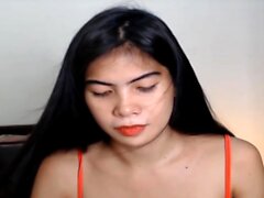 Hübsche Transe Pinay Babe masturbiert auf der Webcam