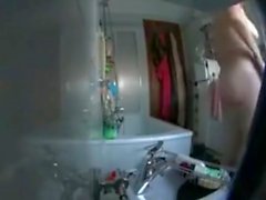 spying mothers sexy ass in the bathroom