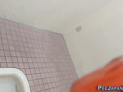 Asian ho pees in toilet