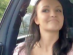 Hitchhiking brunette flashes her tits