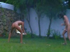 Russian chicks watersports in the grass