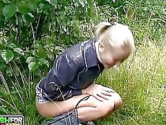 Young amateur blonde chick sucks huge boner outdoors