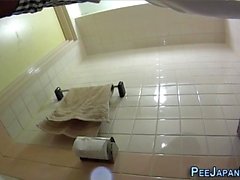 Unsuspecting teen pissing